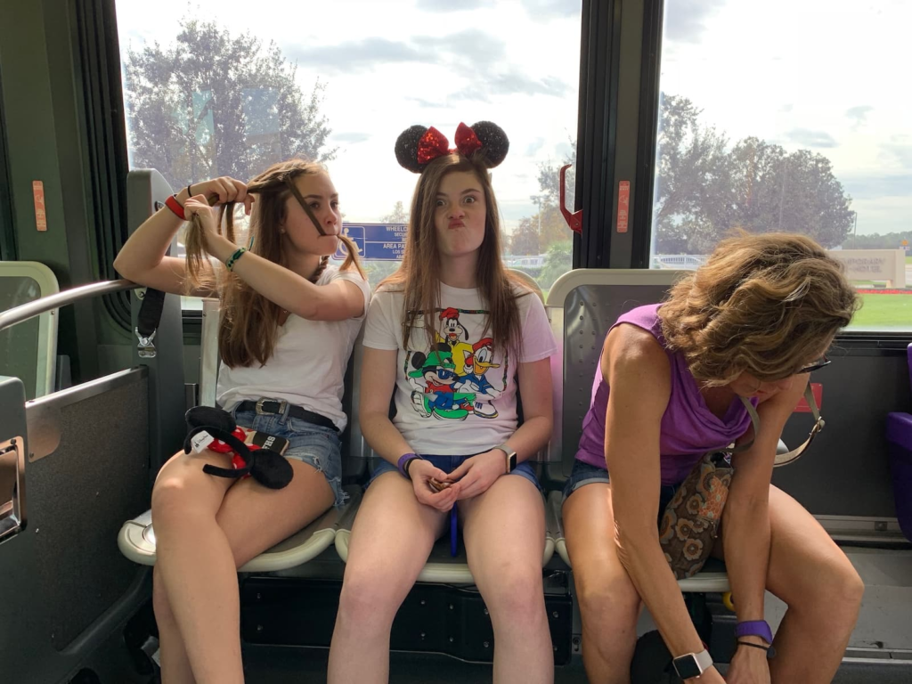 Family taking a Disney bus before starting a relaxed day at Disney World